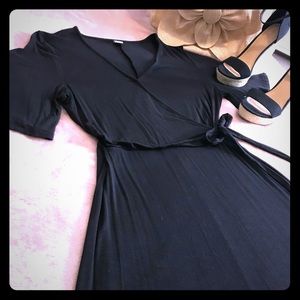 Two side bow tie wrap black and burgundy dresses.